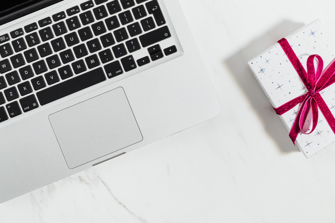 Unbranded product packaging prepared for influencer gifting on a workspace table